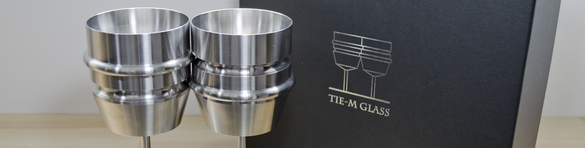 TIE-M GLASS